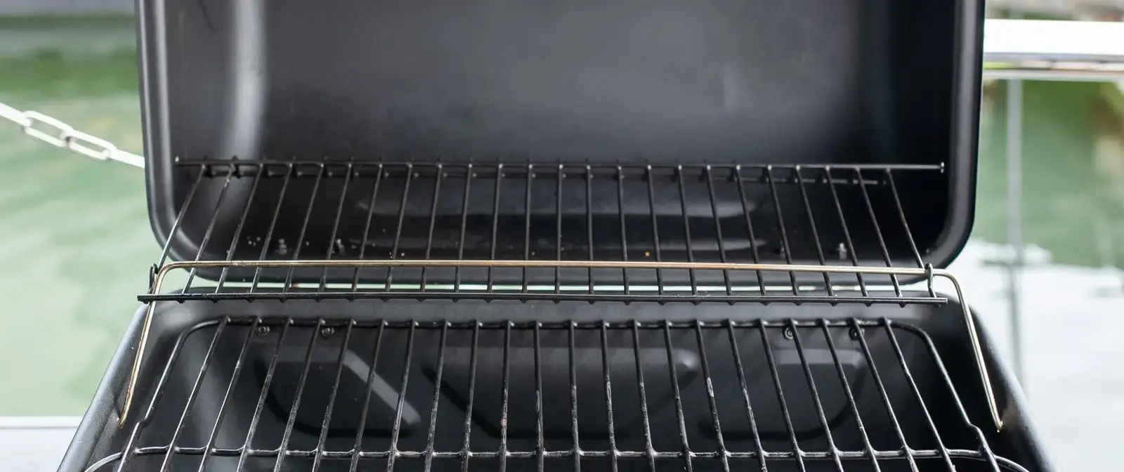 Barbecue grill standing in a backyard